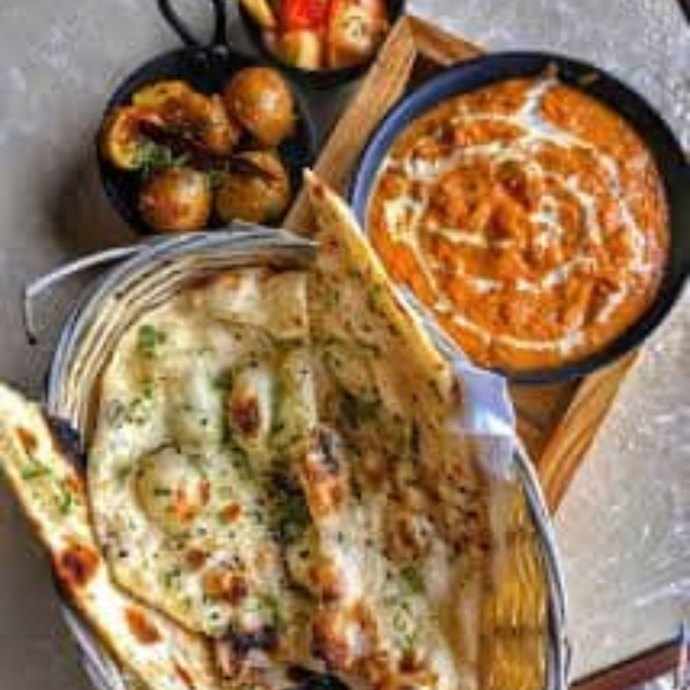 BUTTER CHICKEN, GARLIC NAAN, SALAD